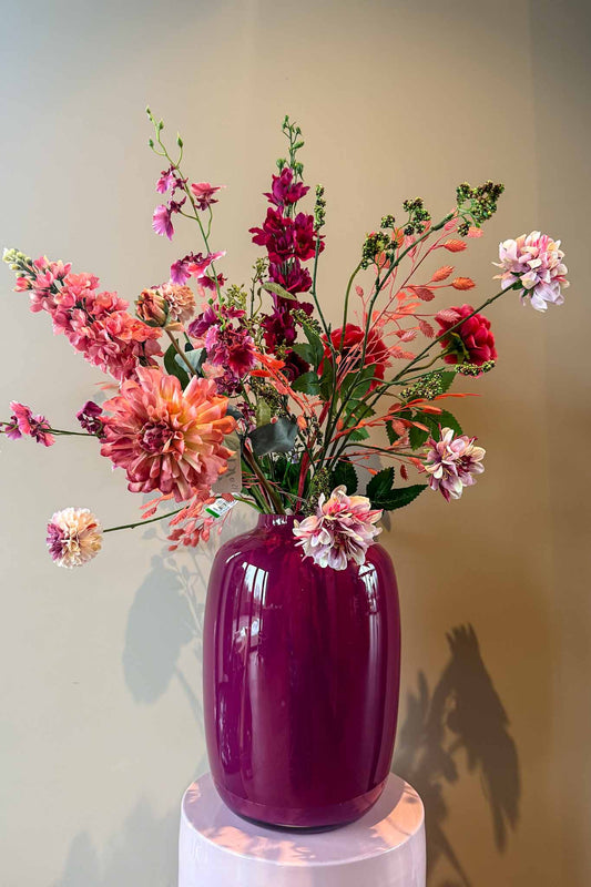 Zijden voorjaarsboeket in roze en rood tinten