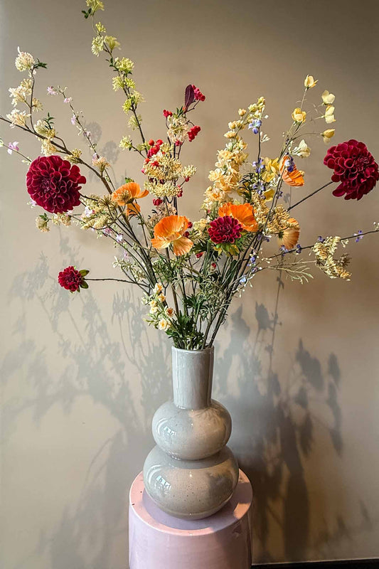 Zijden voorjaarsboeket in kleur tinten